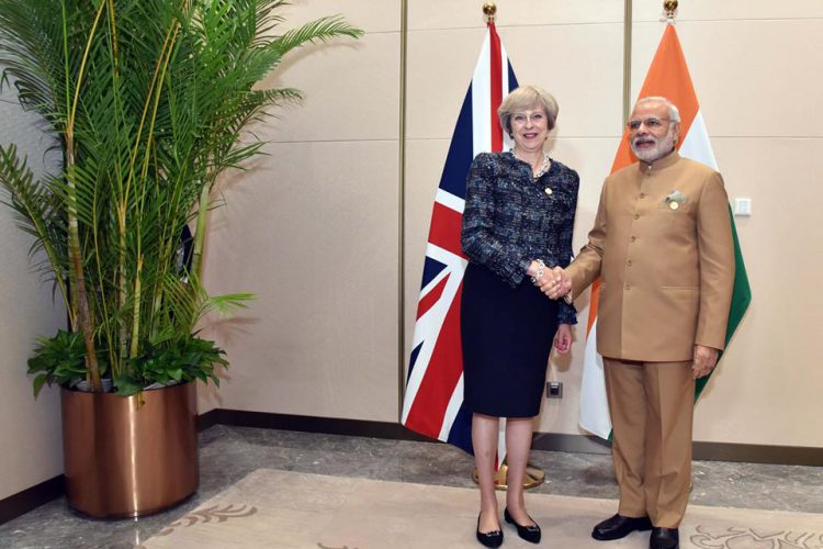 British Prime Minister Theresa May, right, and her Indian counterpart Narendra Modi